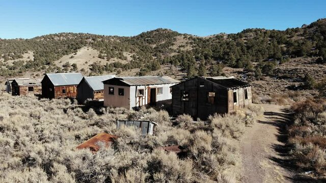 Nevada Cinnabar Mine and Ghost Town.  The Mine Produced Mercury from 1914 to 1918.  Ruins of Several Cabins and a 50 Ton Furnace Remain.  Located in the Shoshone Range near Ione, Nevada.  Aerial Drone