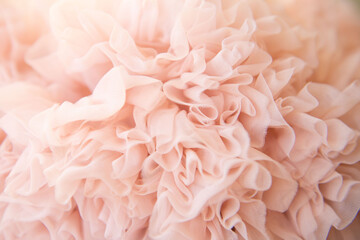 Background of fatin pink color twisted fabric. Abstract background. Selective Focus.