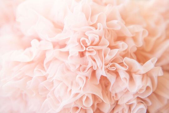 Background of fatin pink color twisted fabric. Abstract background. Selective Focus.