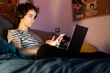 Young adult using laptop