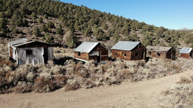 Nevada Cinnabar Mine and Ghost Town.  The Mine Produced Mercury from 1914 to 1918.  Ruins of Several Cabins and a 50 Ton Furnace Remain.  Located in the Shoshone Range near Ione, Nevada.  Aerial Drone