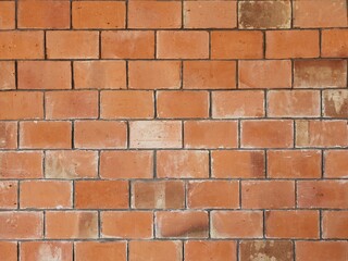 Brick wall with orange brick.Orange brick background.