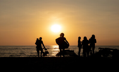 Fototapeta na wymiar Summer outdoor lifestyle of tourism on Beach againt sunset, Bangsean Beach of Thailand