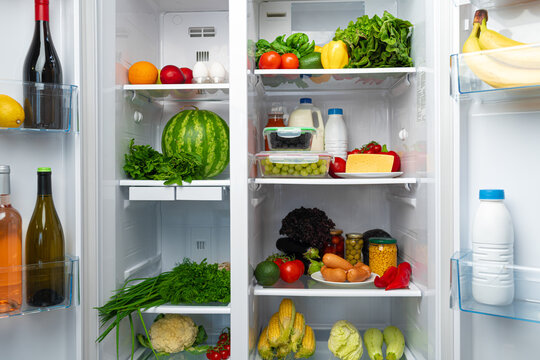 Open Fridge Full Of Fruits, Vegetables And Drinks