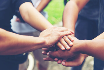 Solidarity unite people hands together community teamwork. Hands of spirit team working together outdoor. Unity strong handshake with people or agreement of feeling or happy diverse education action