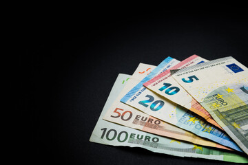 Abstract and conceptual of banknotes and money on black background.