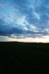 Obraz premium colourful sunset sky over fields in essex, photographed in April 2017