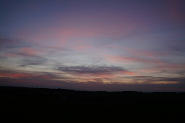 colourful sunset sky over fields in essex, photographed in April 2017