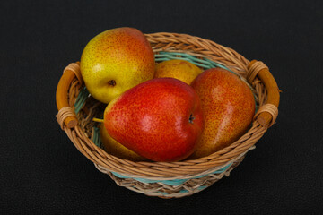 Pear heap in the wooden basket