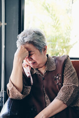 stressed depressed fatigued sad upset asian old asian elderly senior elder woman