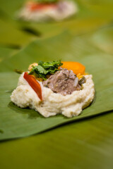 Making Tamales a Latin American dish.