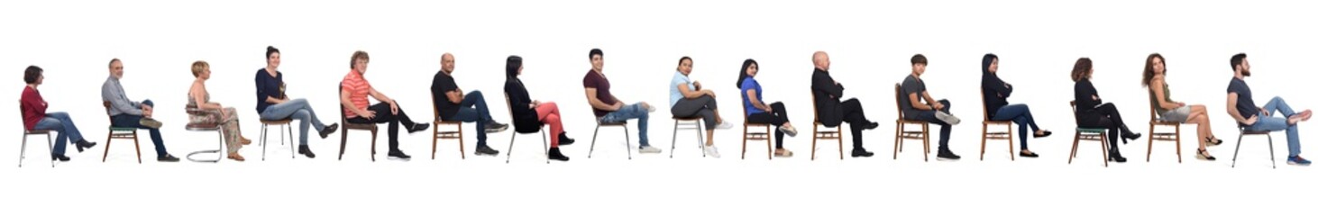 Group of people sitting cross-legged on white background