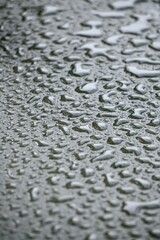 raindrops on the metallic floor,  abstract background