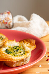 Homemade quiche with organic vegetarian recipes egg broccoli spinach gouda cheddar cheese serving in mini pie tart as a party savory food appetizer