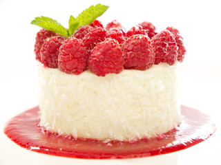 cheesecake with raspberries and fruit sauce