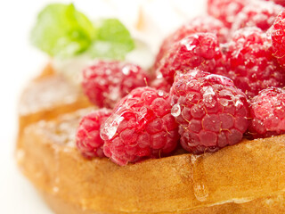 waffles with raspberries and whipped cream