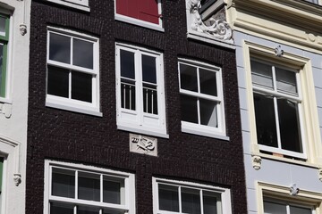 Obraz premium Detail on Old House Facade in Amsterdam