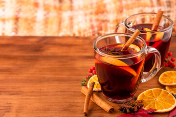 German tradition winter Christmas market new year holidays festival drink tea Gluhwein Mulled sweet hot warm red Wine with spices citrus aromatic cinnamon star anise