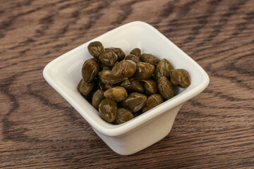 Tasty capers in the bowl