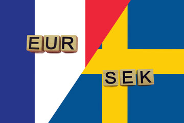 France and Sweden currencies codes on national flags background