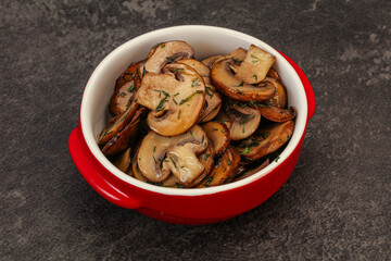 Roasted champignon with herbs and spices