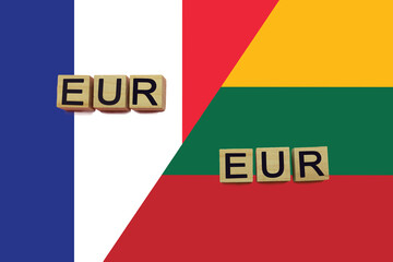 France and Lithuania currencies codes on national flags background