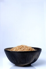Raw brown rice in a bowl