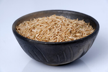Raw brown rice in a bowl