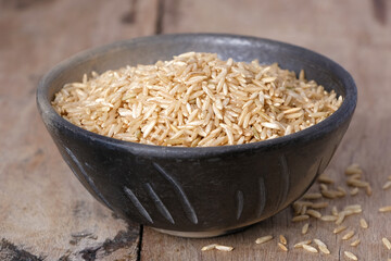 Raw brown rice in a bowl