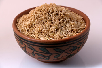 Raw brown rice in a bowl