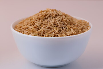 Raw brown rice in a bowl