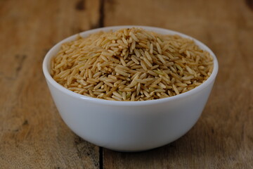 Raw brown rice in a bowl