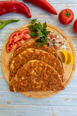 Turkish food: lahmacun, Turkish pizza, lemon, parsley. top wiev