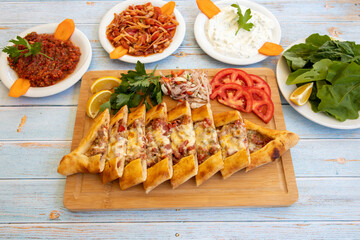 Traditional turkish baked dish pide. Turkish pizza pide, Middle eastern appetizers. Turkish...