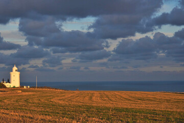 Lighthouse in the light of sunset