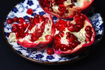 Pomegranates On A Black Background