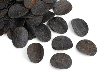 Fototapeta na wymiar Chips black. Chips with added charcoal and peppers. White background