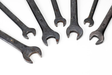 Spanner Set Isolated. dark coloured spanners on white background.