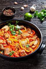 Moqueca baiana - brazilian fish stew with lime