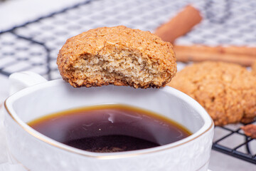 Oatmeal cookies with tea on the table