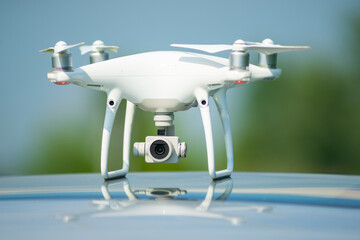 Quadrocopter on the roof of a car..