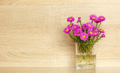 small pink flowers in a vase