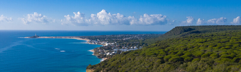 Drone views of long panorama image of la Breña pine forst and cape of Trafalgar in Cadiz, Spain...