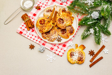 Fototapeta na wymiar Christmas or New Year sweet apple puffs, fresh homemade bakery