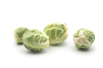 Fototapeta premium Closeup of organic brussels sprouts on white background