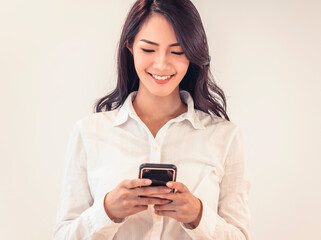 Portrait of  happy  businesswoman using mobile phone