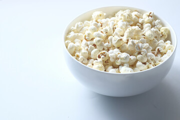  popcorn in a bowl on white background 