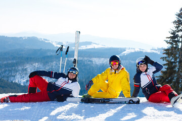 Portrait of smiling skiers in the mountains