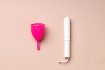 Top view of menstrual cup and medical tampon