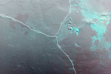 Abstract wall texture with crack lines and tirquoise paint spots. Aqua blue wall texture.